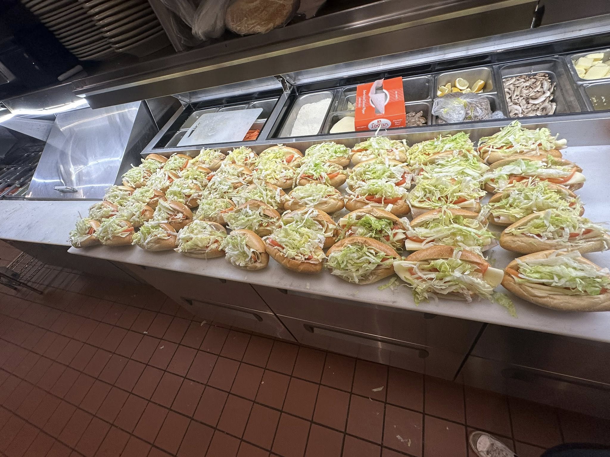 Large catering order of subs from Palumbo Pizza Hampden Township